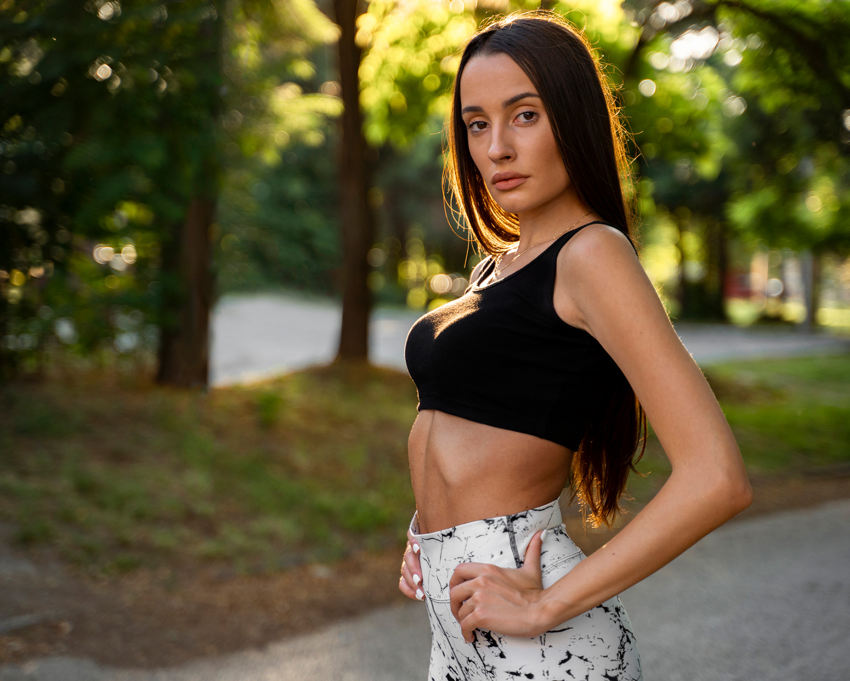 Woman standing in workout clothes